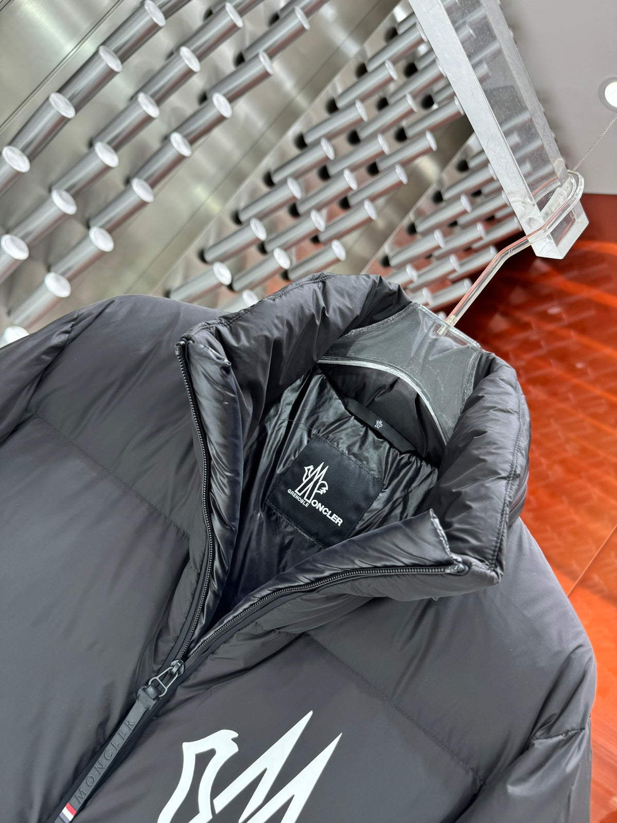 Moncler Black Technical Alpine Down Jacket with Oversized White Logo Print