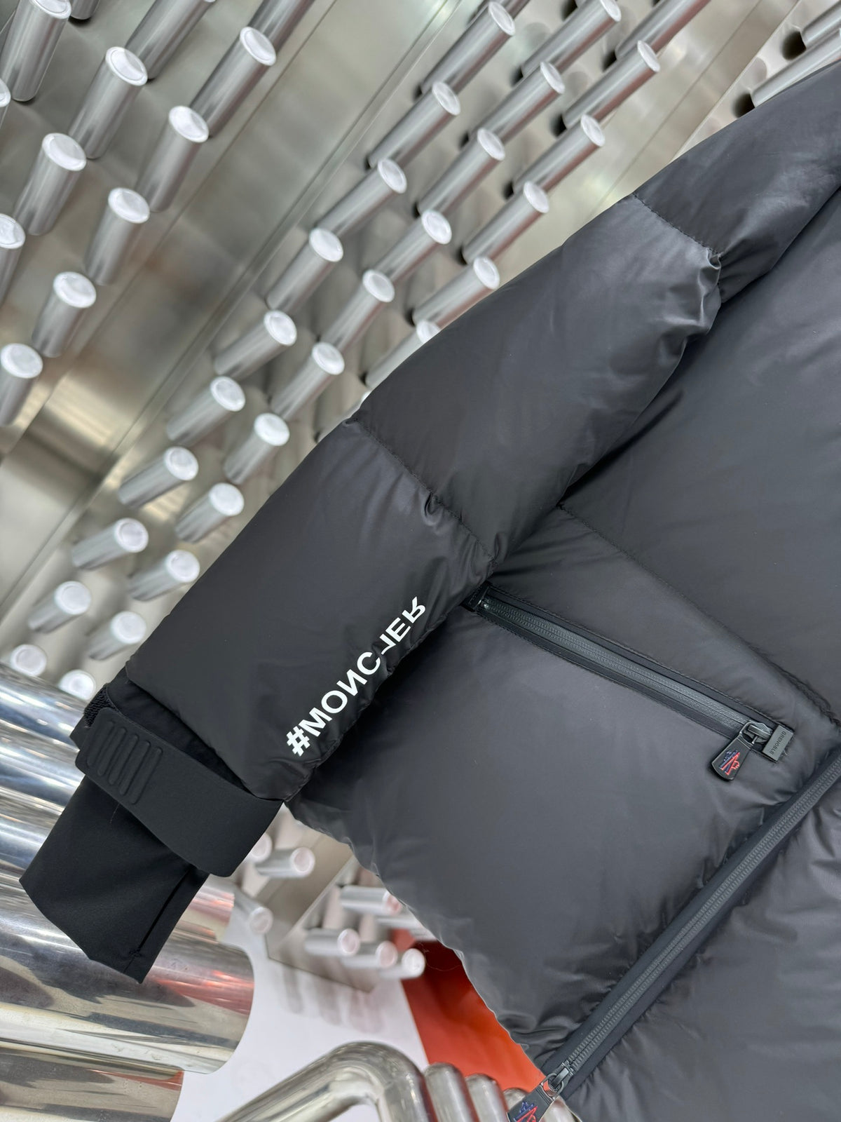 Moncler Black Technical Alpine Down Jacket with Oversized White Logo Print