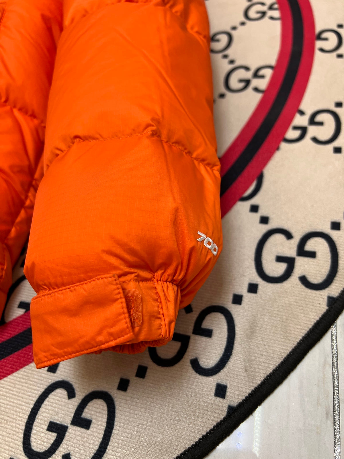 The North Face Orange Nuptse Down Jacket