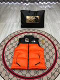 The North Face Orange Nuptse 700 Puffer Vest