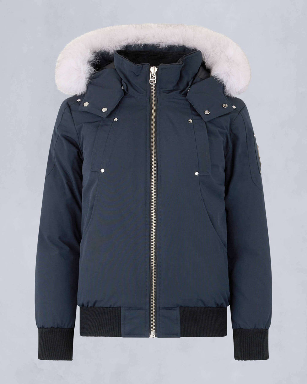 Moose Knuckles Steel Blue Down Bomber Jacket with White Fur Hood and Black Ribbed Trim