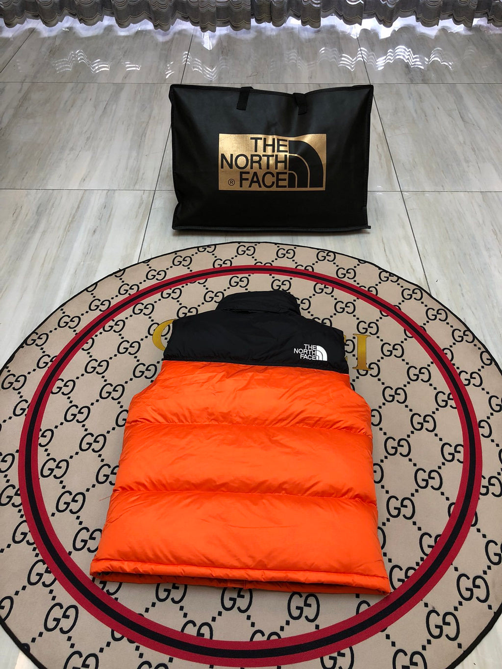 The North Face Orange Nuptse 700 Puffer Vest
